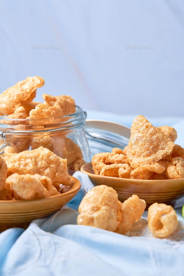 Pork Rinds also called chicharron or chicharrones and tortilla Stock